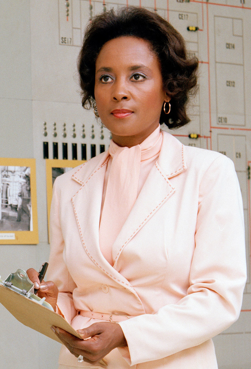 Annie Easley with a clipboard in her hands