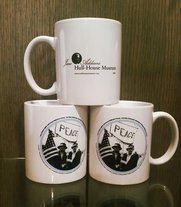 mugs with Hull House logo and Jane Addams graphic on them