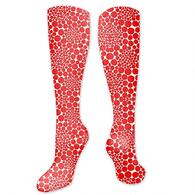 knee-high socks featuring Yayoi Kusama polka dots