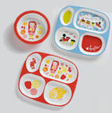 children's plates and bowl based on Mary Blair designs
