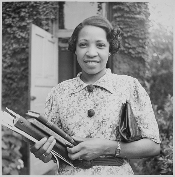 young Lois Mailou Jones holding books