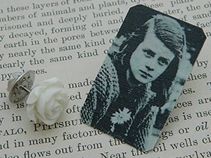 set of pins: one white rose and one Sophie Scholl image